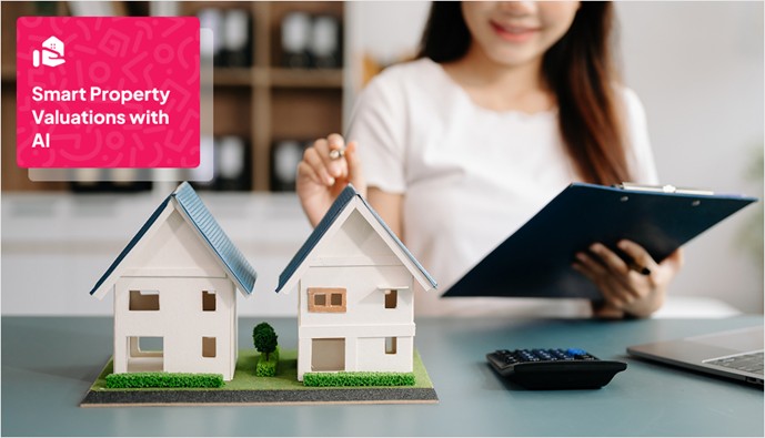 a house miniature placed on a table with a human shown in the background