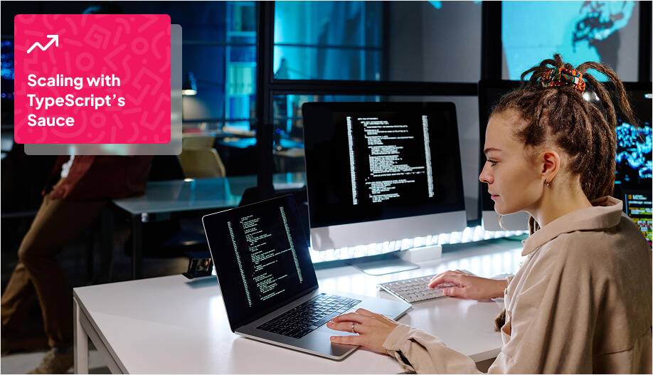 a woman looking at her laptop screen