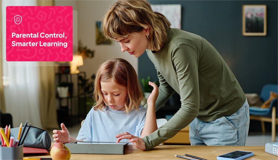 a mother teaching her child how to use the tablet