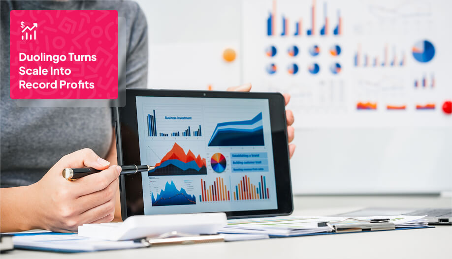 a tablet screen showing a dashboard full of charts and graphs showcasing financial performance