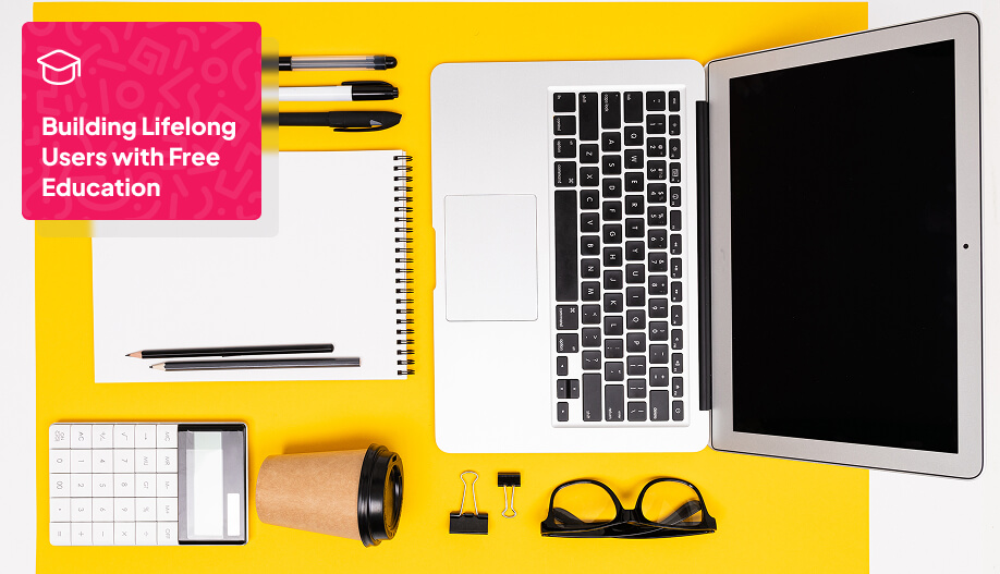 student's essentials such as laptop, glasses, pen and paper, calculator, and a cup of coffee